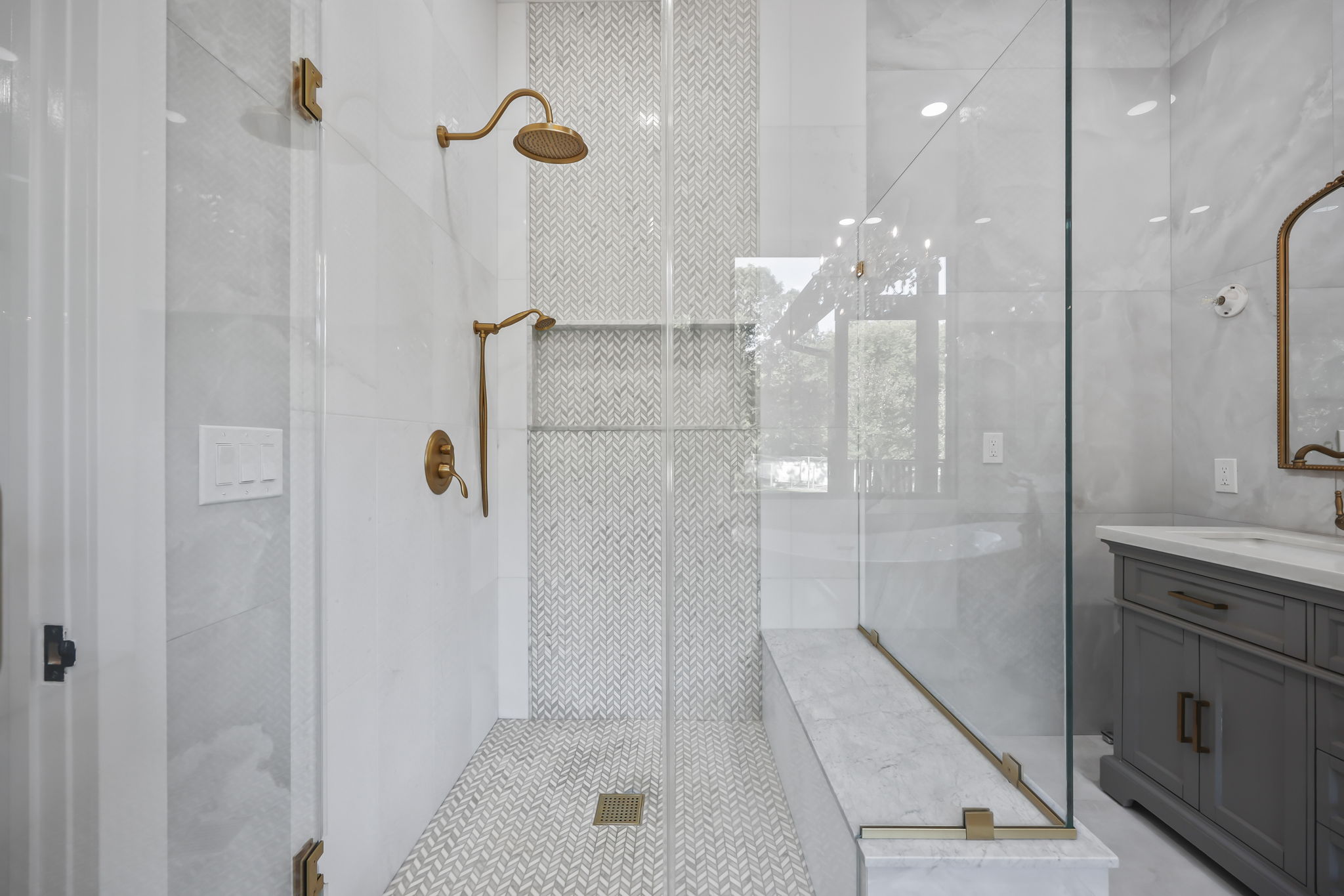Luxury bathroom with marble and brass