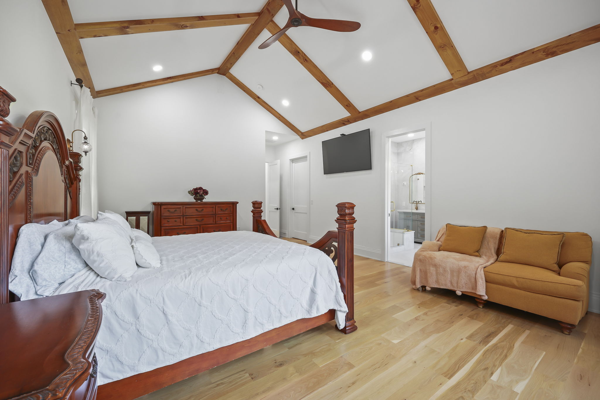 Master bedroom with vaulted ceiling
